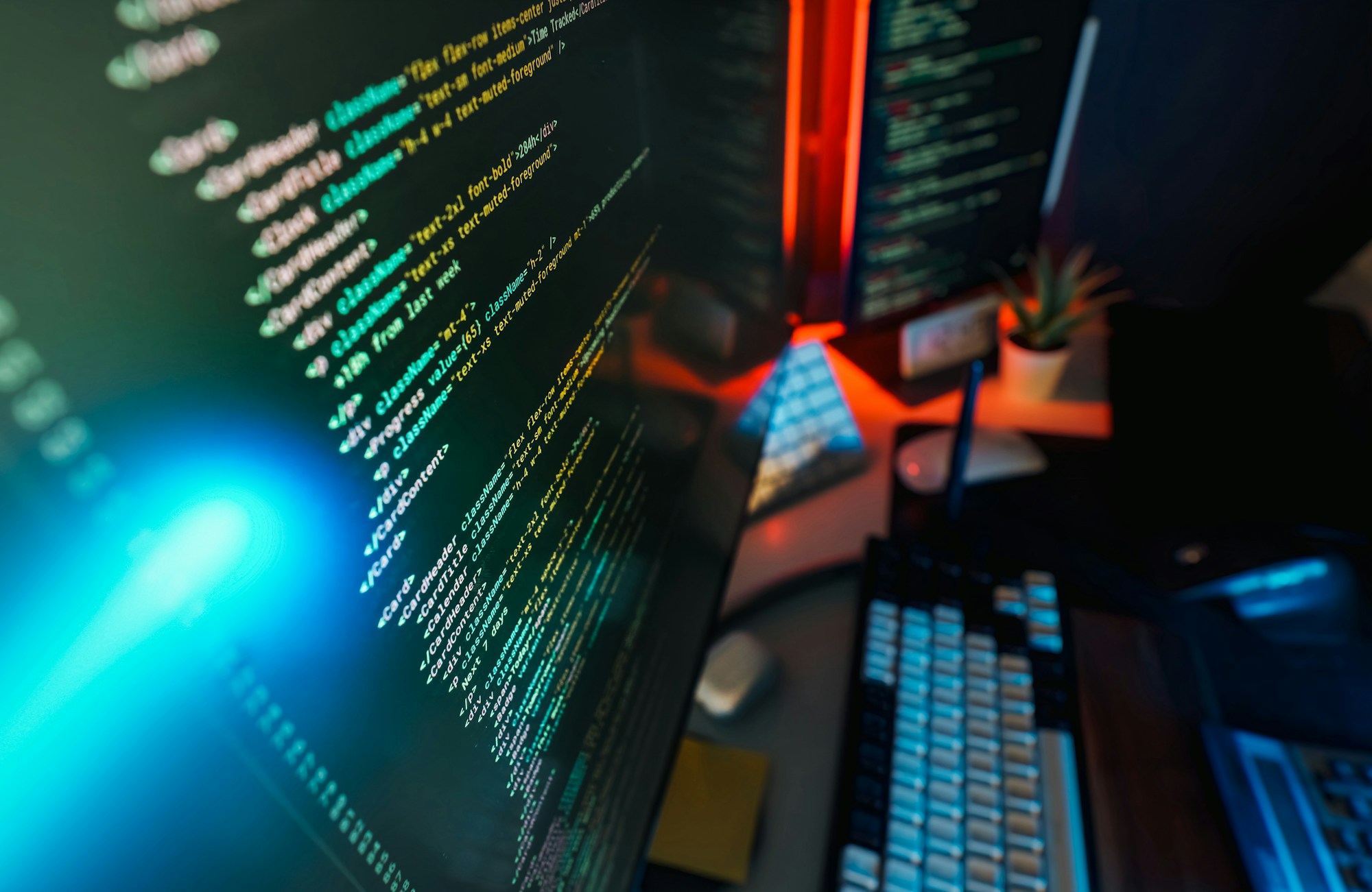 Code on screens illuminated with ambient lighting